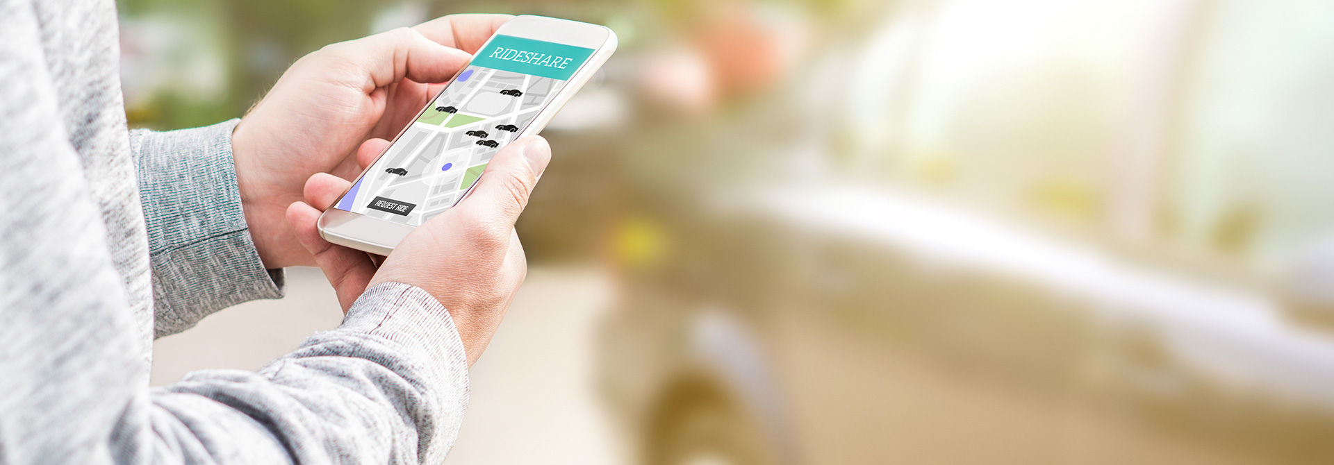 A man requesting a ride share using the Uber app | Virginia Uber & Lyft Accident Attorneys
